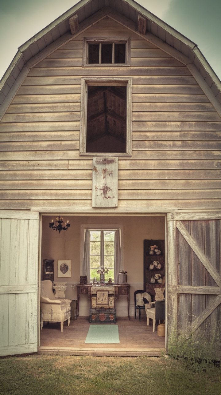 Escape to the countryside with this captivating vintage farmhouse. Its weathered exterior and rustic barnyard setting create an idyllic rural escape, while the interior reveals a treasure trove of antique furniture and shabby-chic accents. Experience the warmth of a bygone era in this charming home, where farmhouse chic meets vintage country charm for an unforgettable aesthetic.